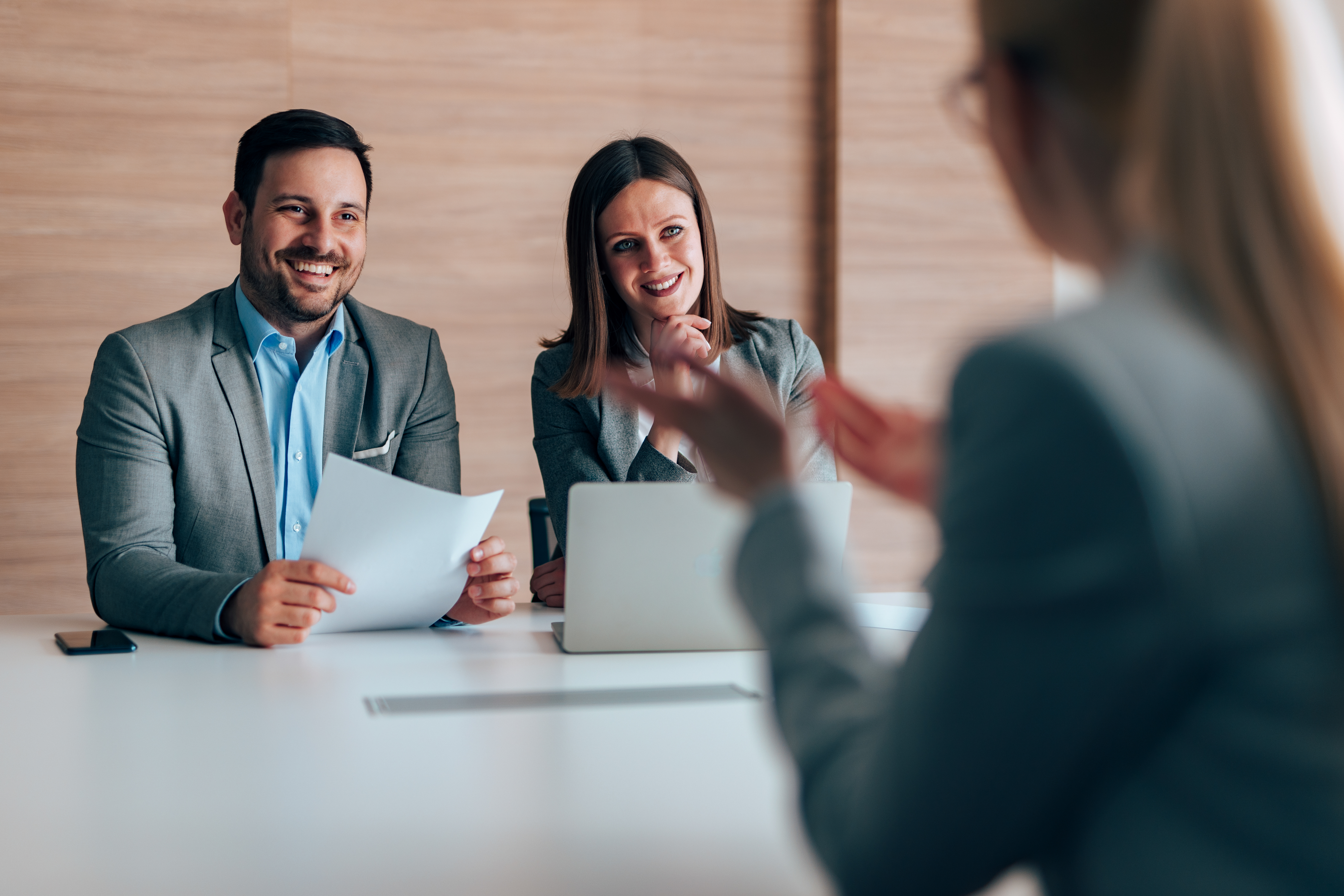 elegantly-dressed-business-people-having-a-meeting-2024-10-11-23-04-52-utc.jpg